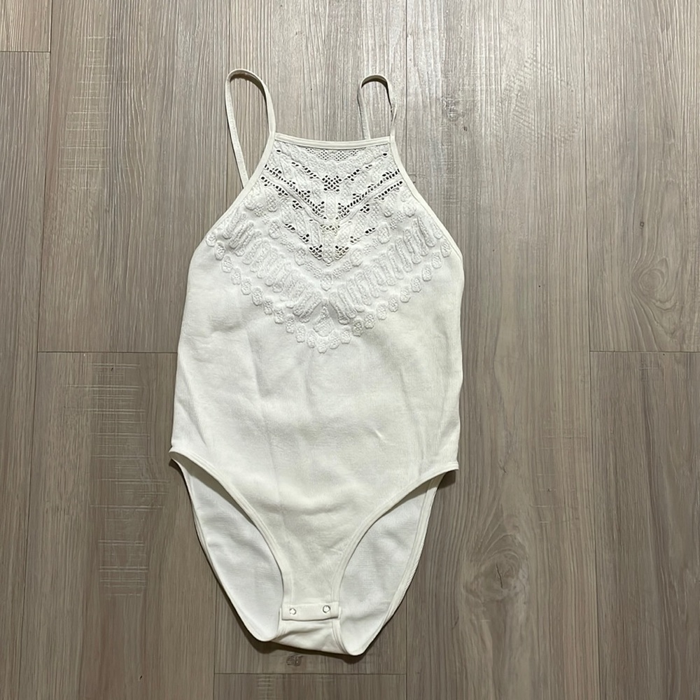 NWT free people body suit! Snap close. Super comfy! Size xs/s